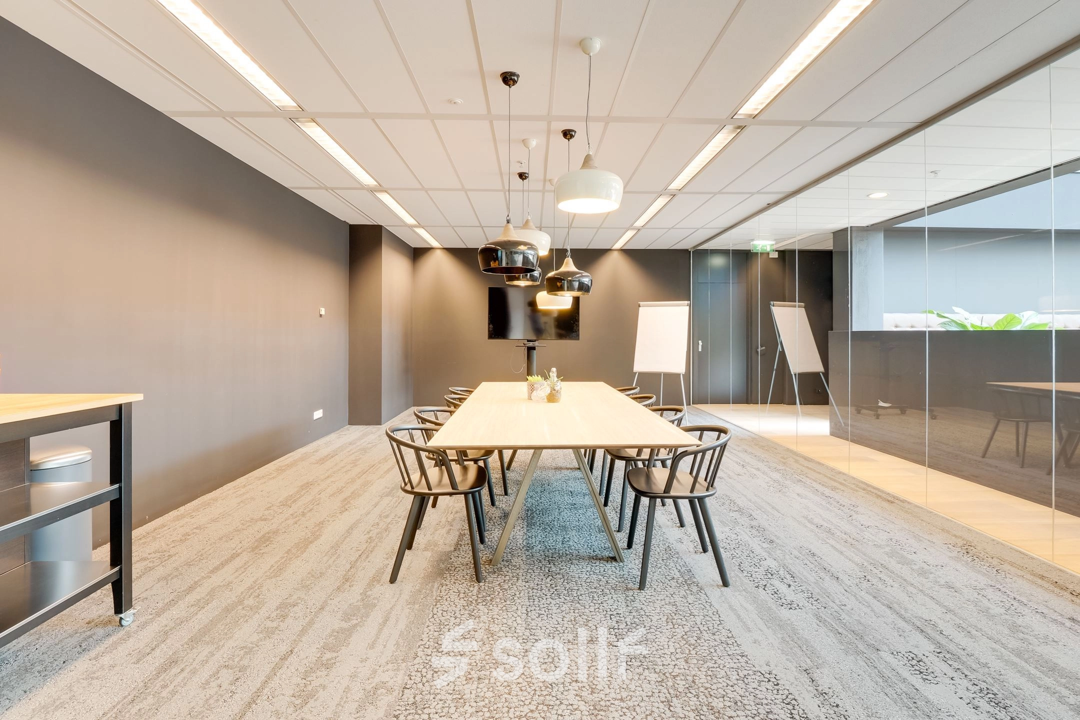 Modern conference room with a large table and chairs at Computerweg 22, ideal for office space rental in Utrecht Lage Weide.