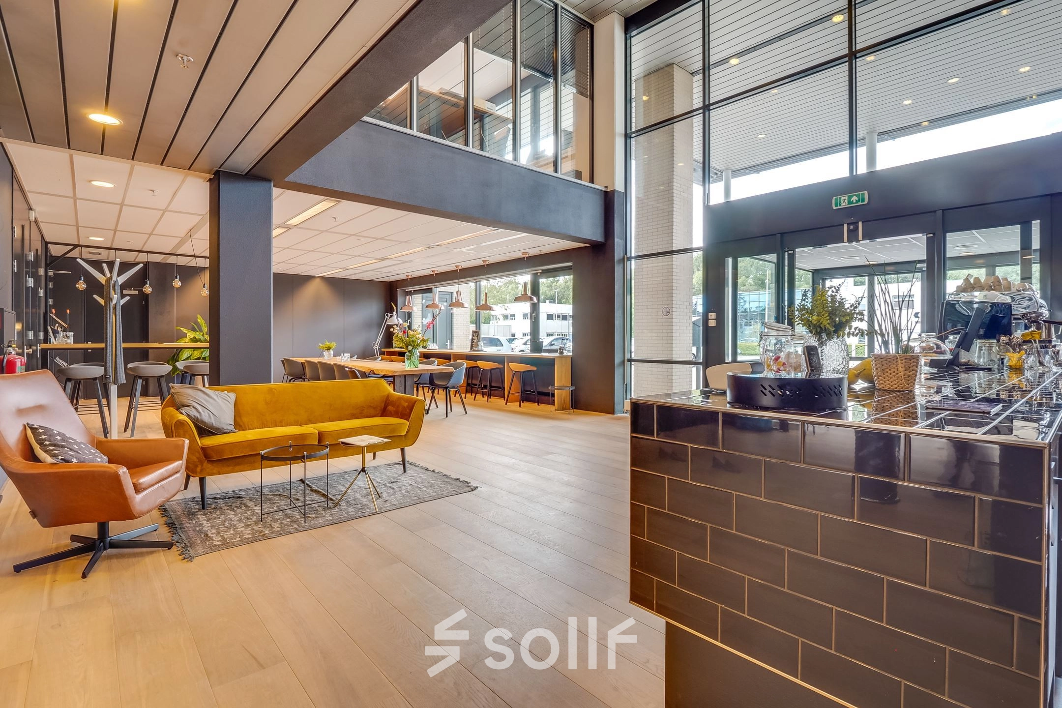 Modern office space with stylish seating and natural light, ideal for office space rental at Computerweg 22, Utrecht Lage Weide.