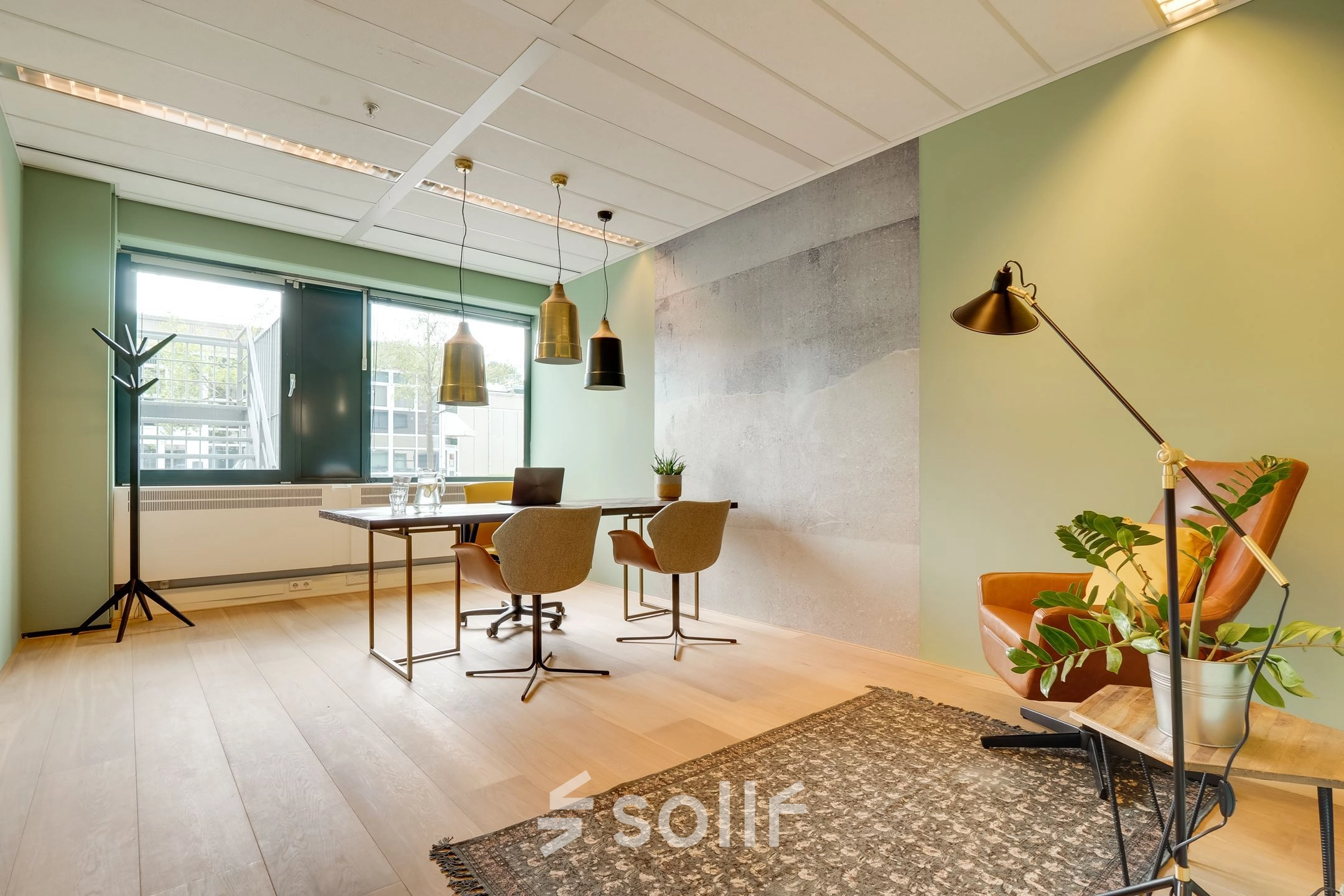 Modern office space with a large window, minimalist decor, and stylish lighting at Computerweg 22, Utrecht Lage Weide, perfect for office space rental.
