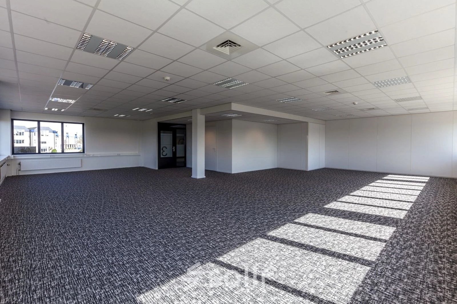 Spacious office to rent at Reactorweg 301 in Utrecht Lage Weide, featuring large windows and a modern feel. Ideal for customizable office space rental.