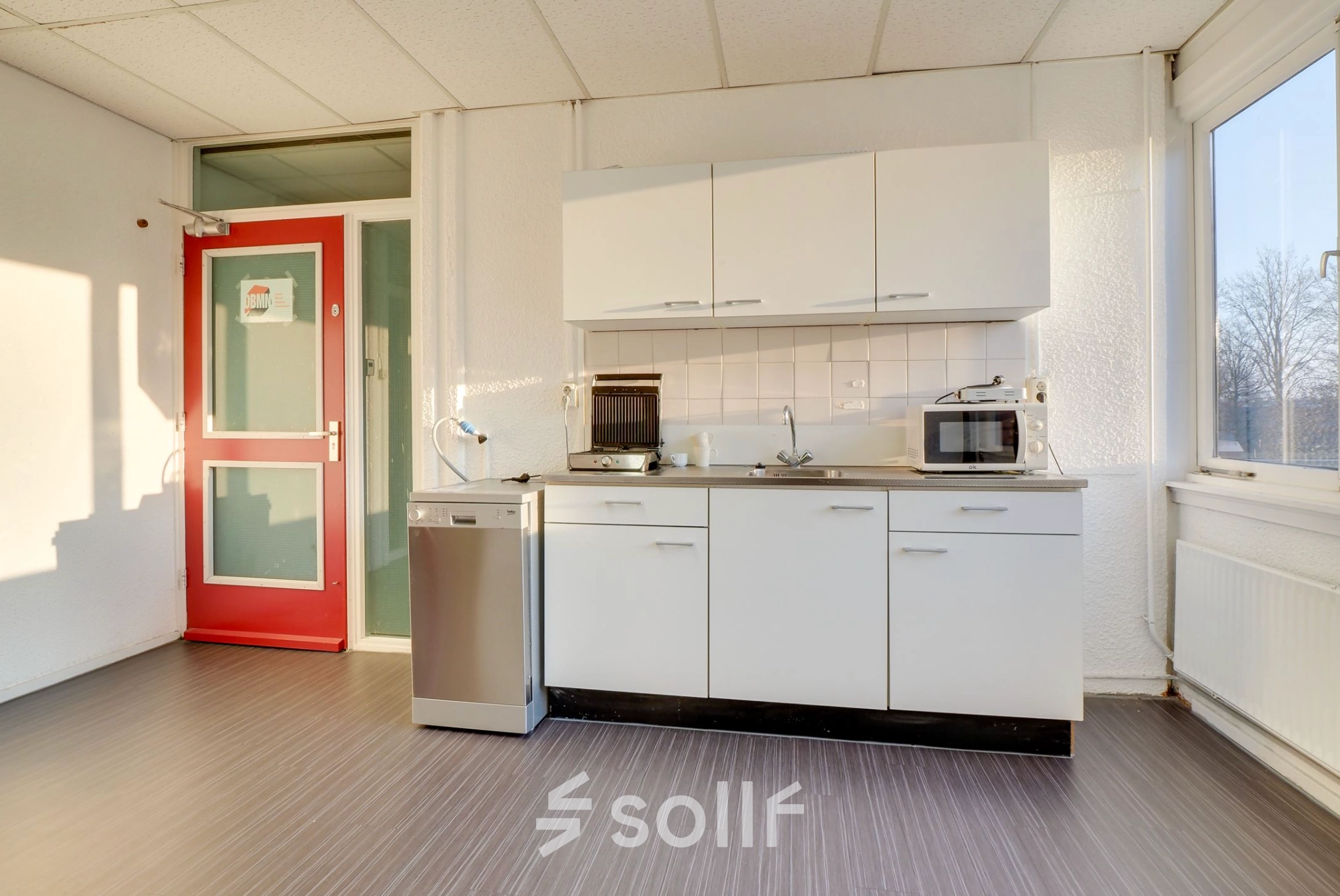 Bright kitchenette area at Zonnebaan 18, Utrecht Lage Weide, ideal for office space rental.