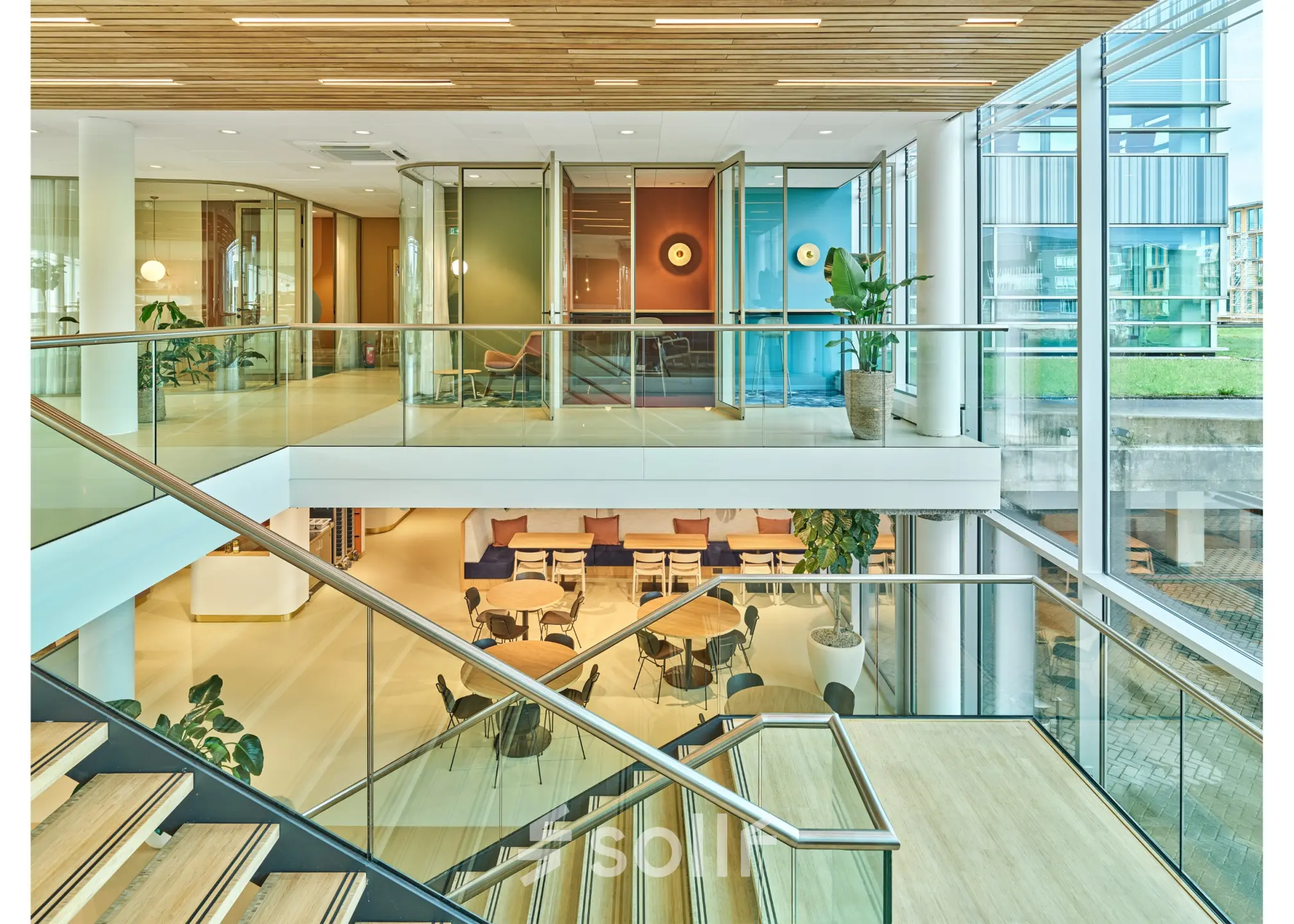 Modern office interior at Van Deventerlaan 30-40 in Utrecht Papendorp, featuring glass walls and workspaces available for rent, complementing office space rental options.
