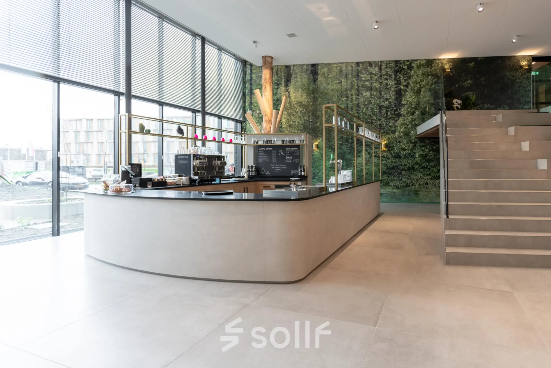 Bright office space with large windows, modern design featuring a reception area with a counter, located at Van Deventerlaan 31-51 in Utrecht Papendorp. Ideal for office space rental.