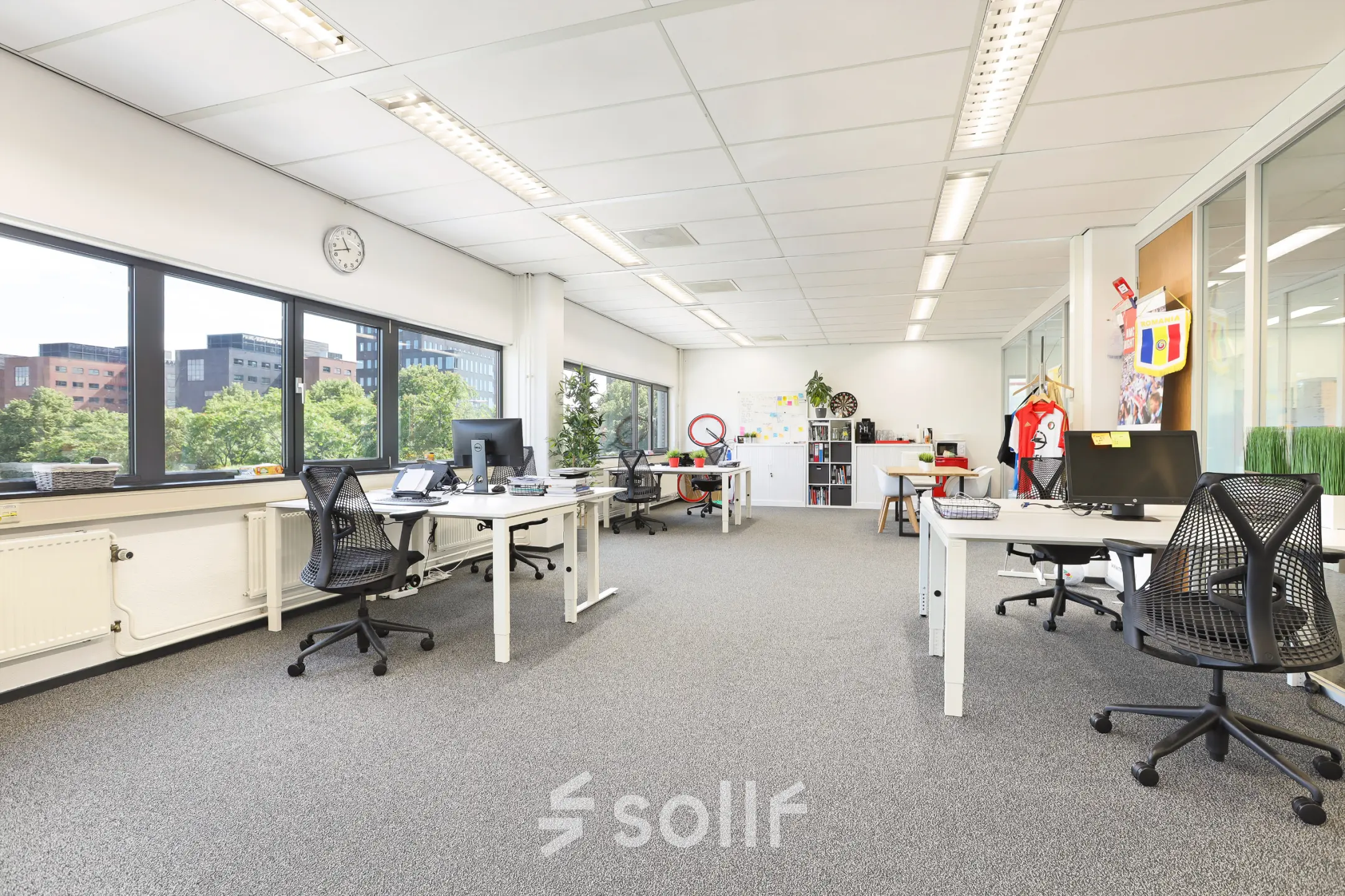 Bright, furnished office space at Winthontlaan 200, featuring modern workstations overlooking Utrecht South, available for office space rental.