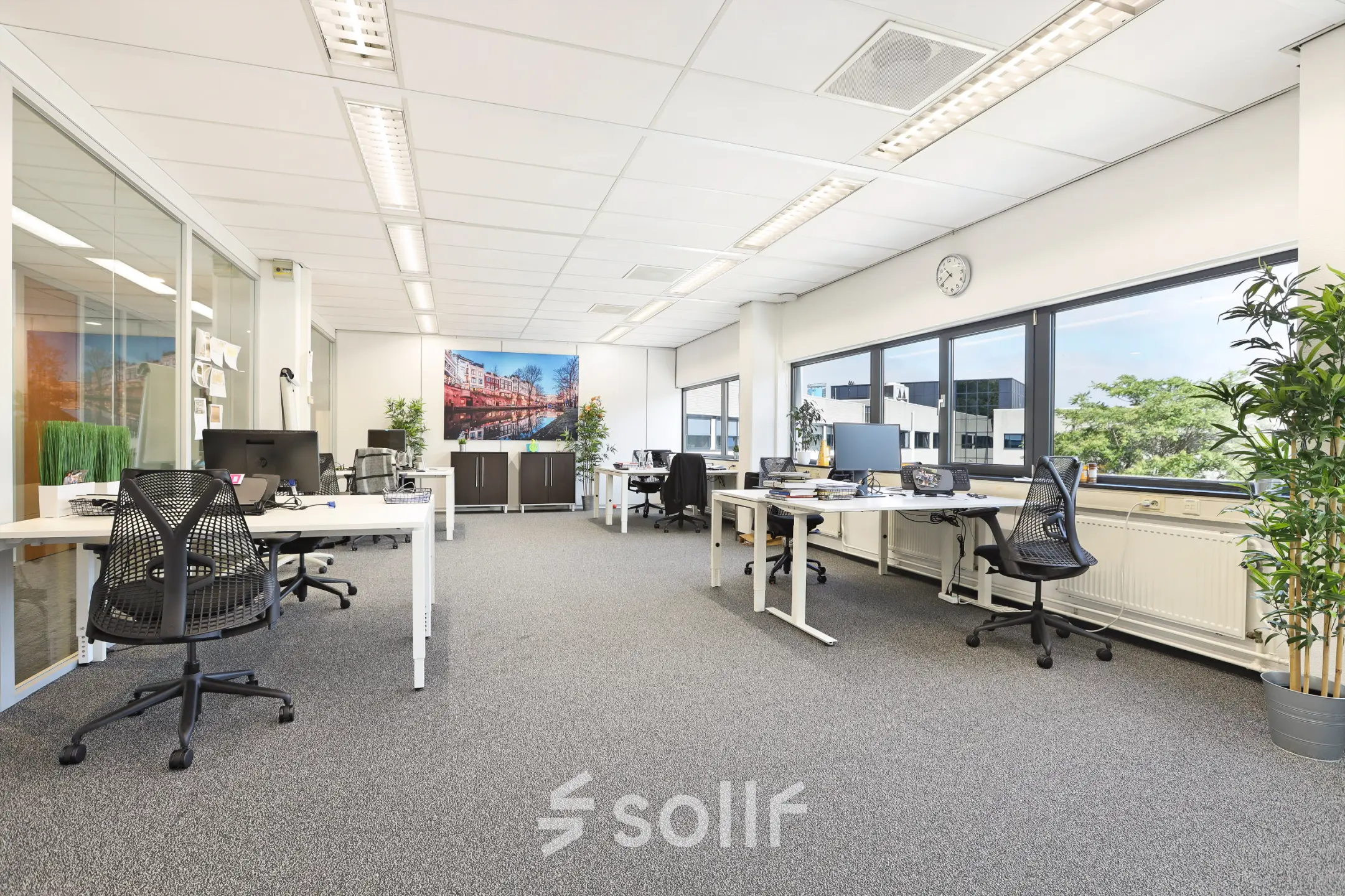 Bright office at Winthontlaan 200, Utrecht South, featuring modern workspaces with desks, chairs, and natural light, ideal for office space rental.