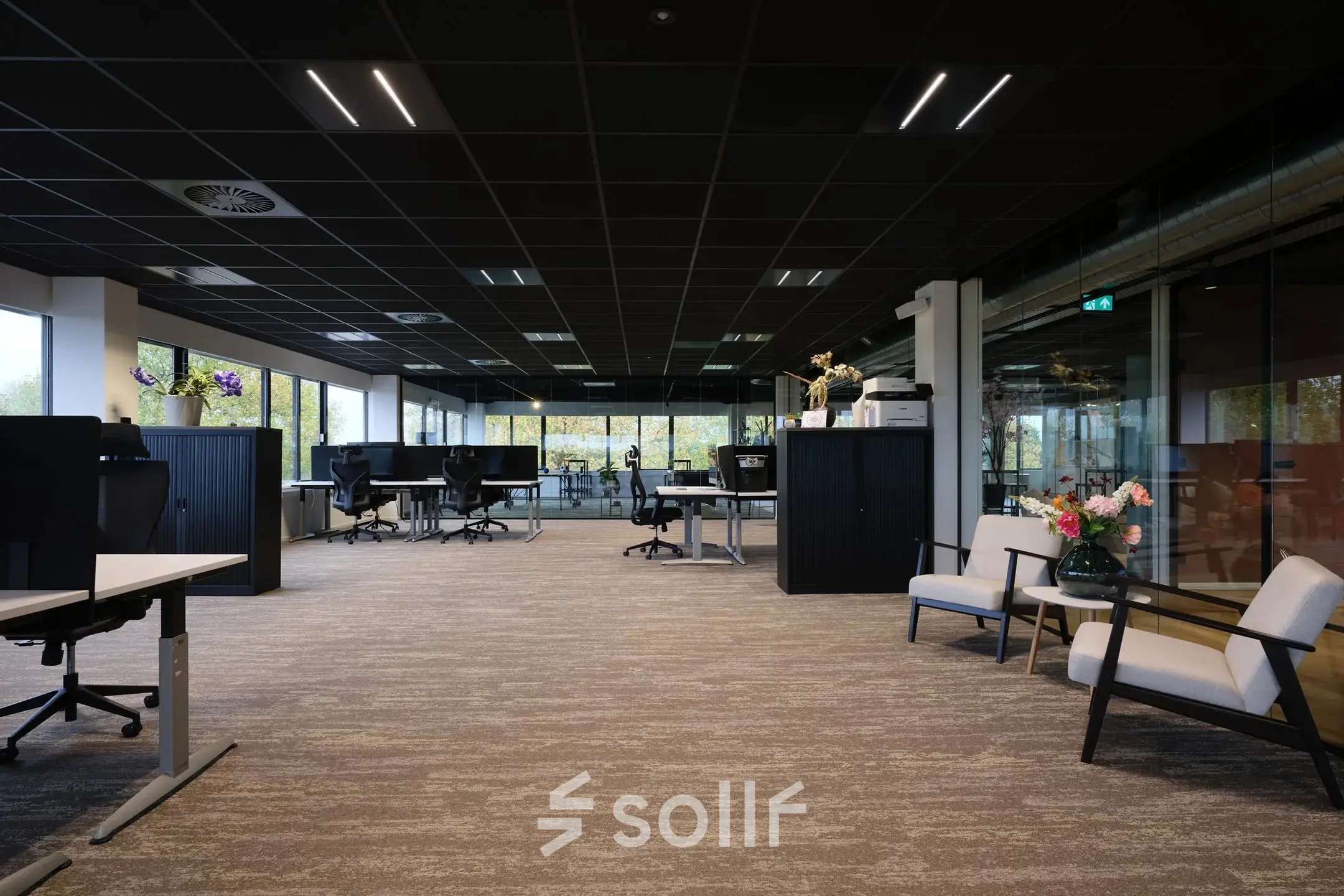 Spacious office with modern furnishings and large windows at Havenweg 24, Vianen Utr, ideal for rent office space seekers.