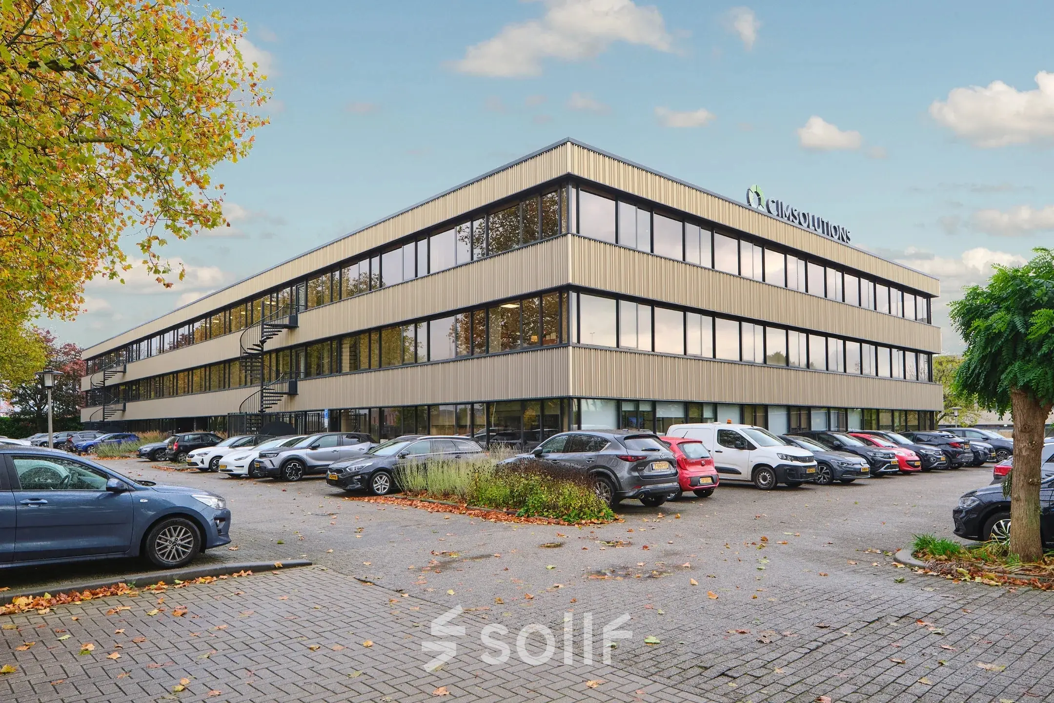 Exterior view of an office building located at Havenweg 24, Vianen Utr, ideal for office space rental with ample parking.