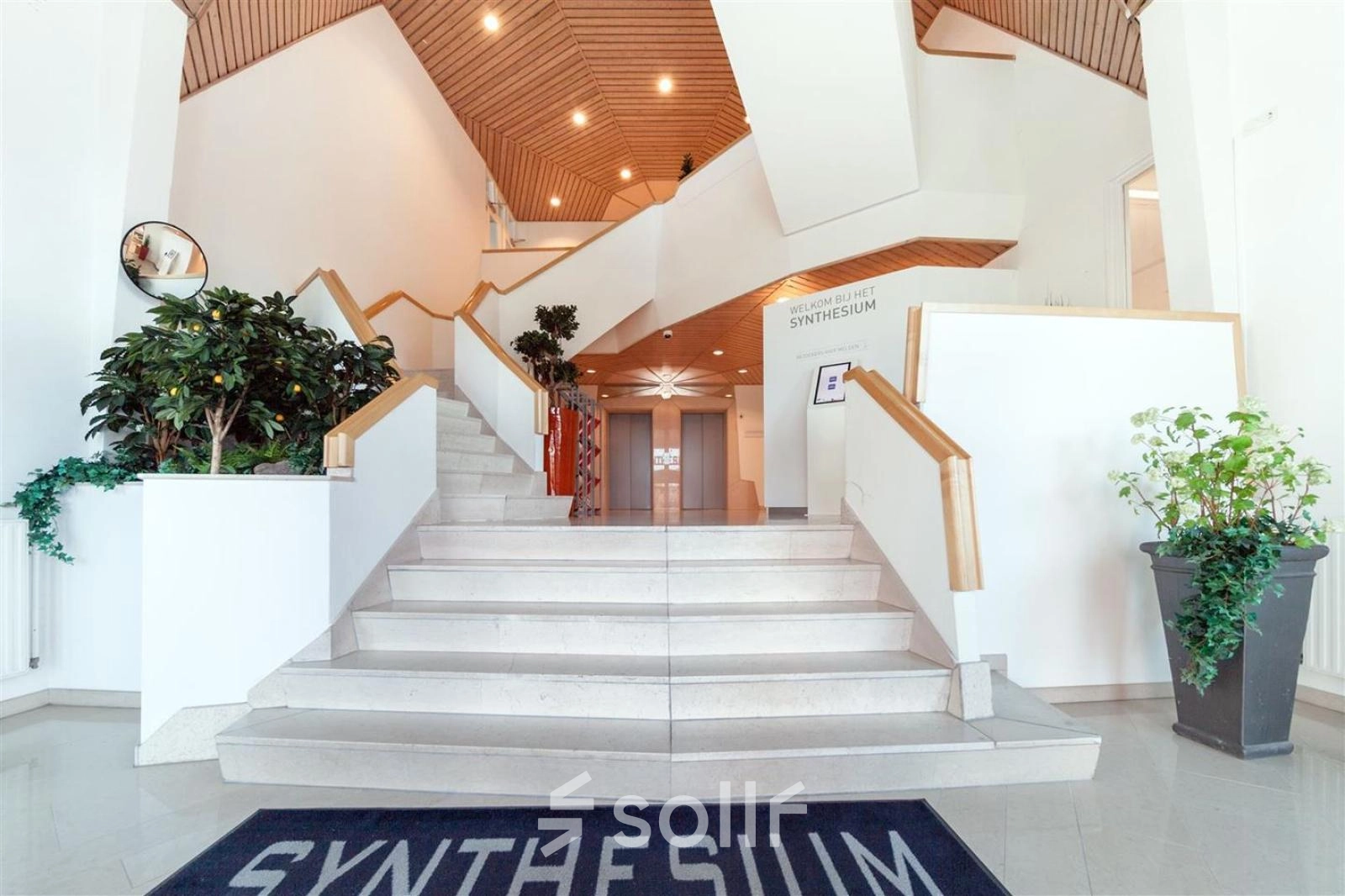 Bright and inviting entrance at Loire 104 - 206, Voorburg, perfect for office space rental with stylish design and ample natural lighting.