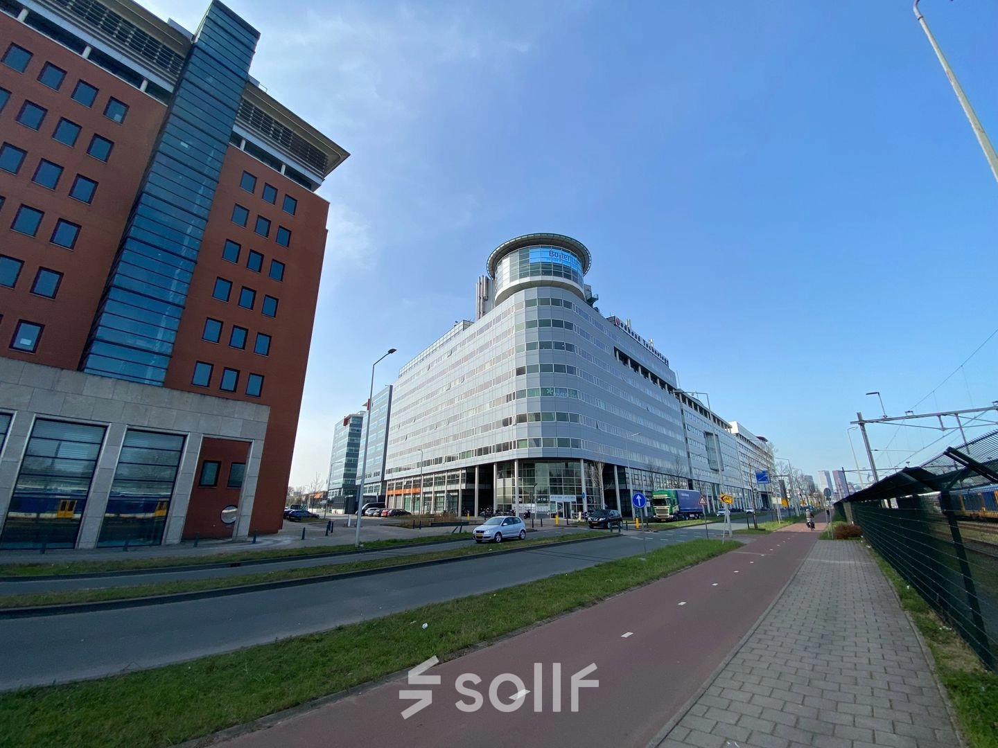 Exterior view of a modern office building at Regulusweg 11, Voorburg, ideal for office space rental.
