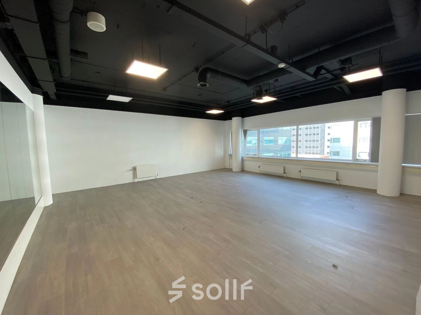 Spacious, unfurnished office interior available for rent at Regulusweg 11, Voorburg. Ideal for customizing your office space rental.