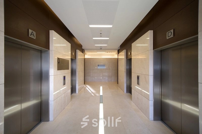 Elevator lobby at Postępu 17A, Warsaw Mokotow, offering convenient access in this office space rental location.