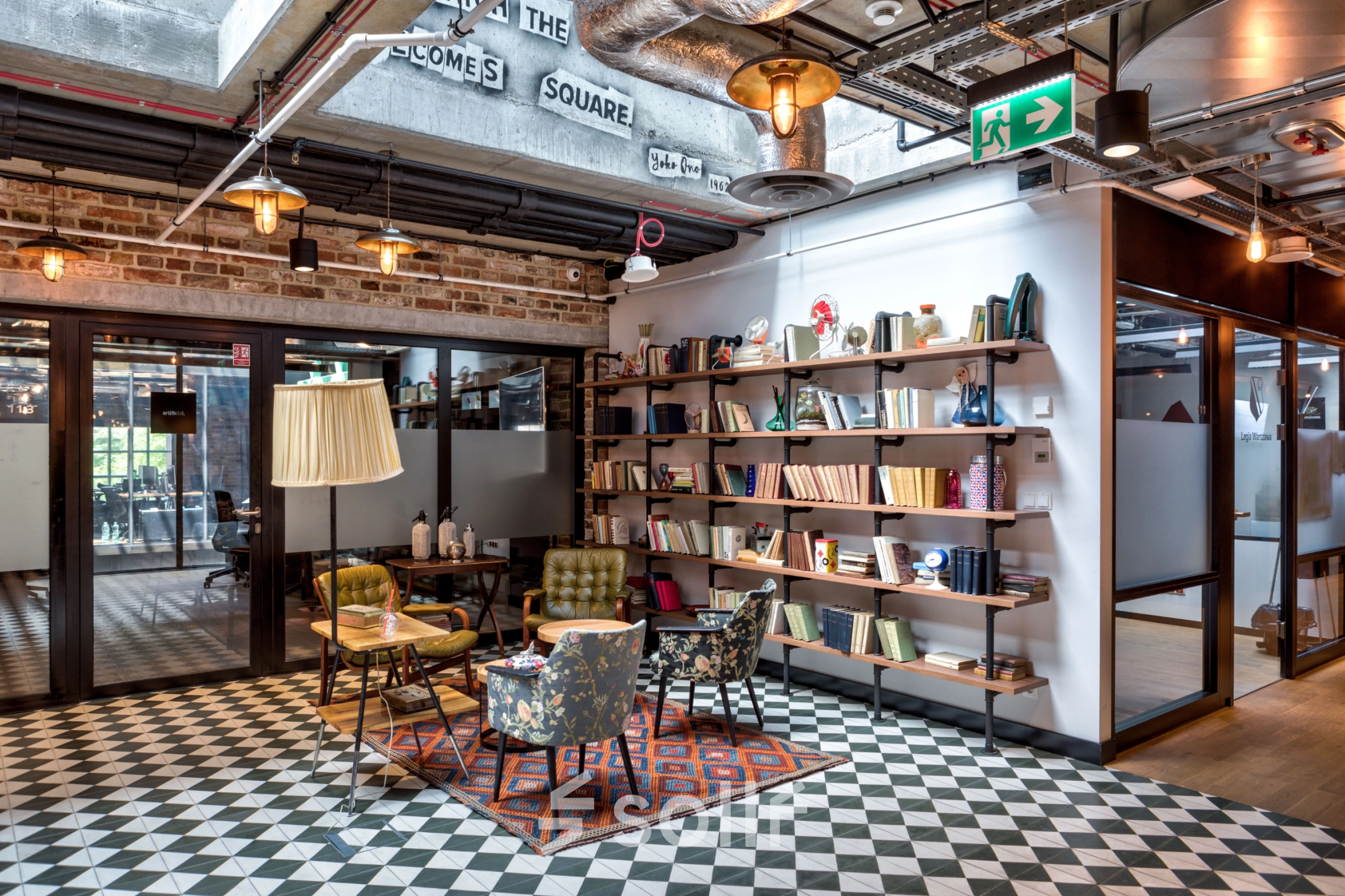 Cozy furnished office space with vintage decor and bookshelves at Koszykowa 61, Warsaw Śródmieście, ideal for office space rental.