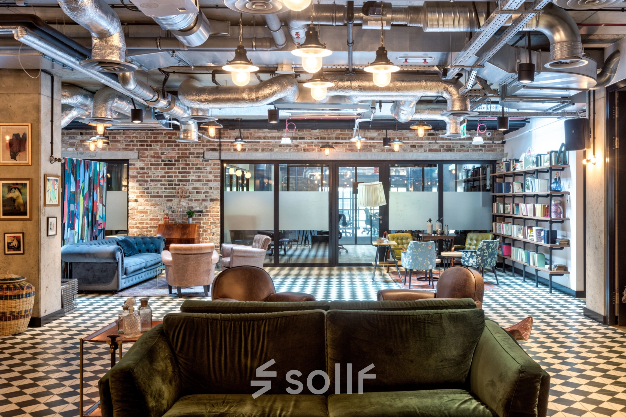 Stylish office to rent at Koszykowa 61, Warsaw Śródmieście with eclectic furnishings and exposed ceilings, perfect for office space rental activities.