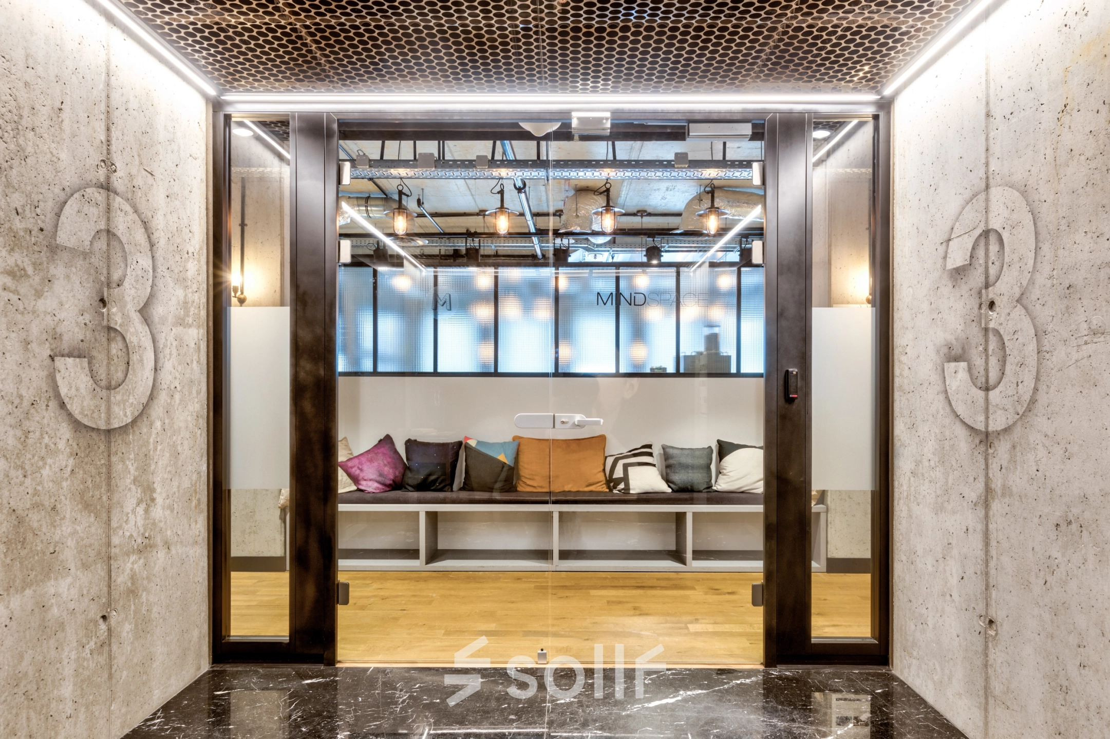 Cozy office space at Koszykowa 65 in Warsaw Śródmieście with a modern design, featuring comfortable seating. Ideal for those looking to rent office space with unique style.