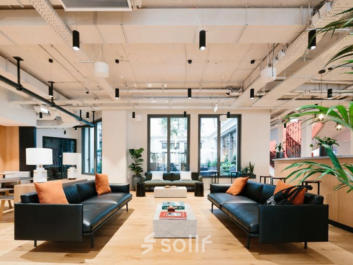 Modern furnished office space with stylish seating at Krakowskie Przedmieście 13, ideal for rent office space in Warsaw Śródmieście.