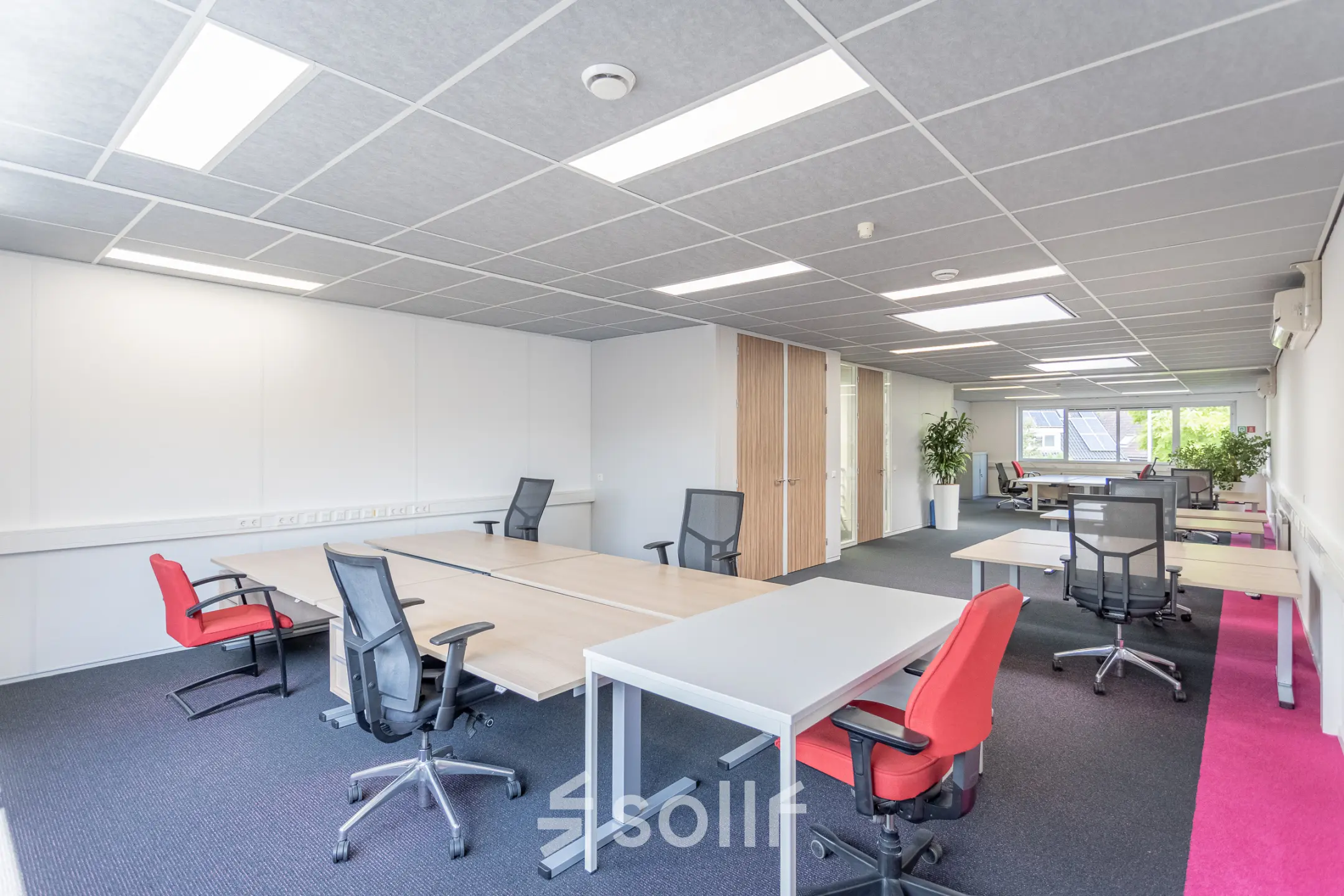 Spacious and bright office space for rent at Molenweer 2, Wateringen with modern furniture and ample natural light, ideal for dynamic business professionals.