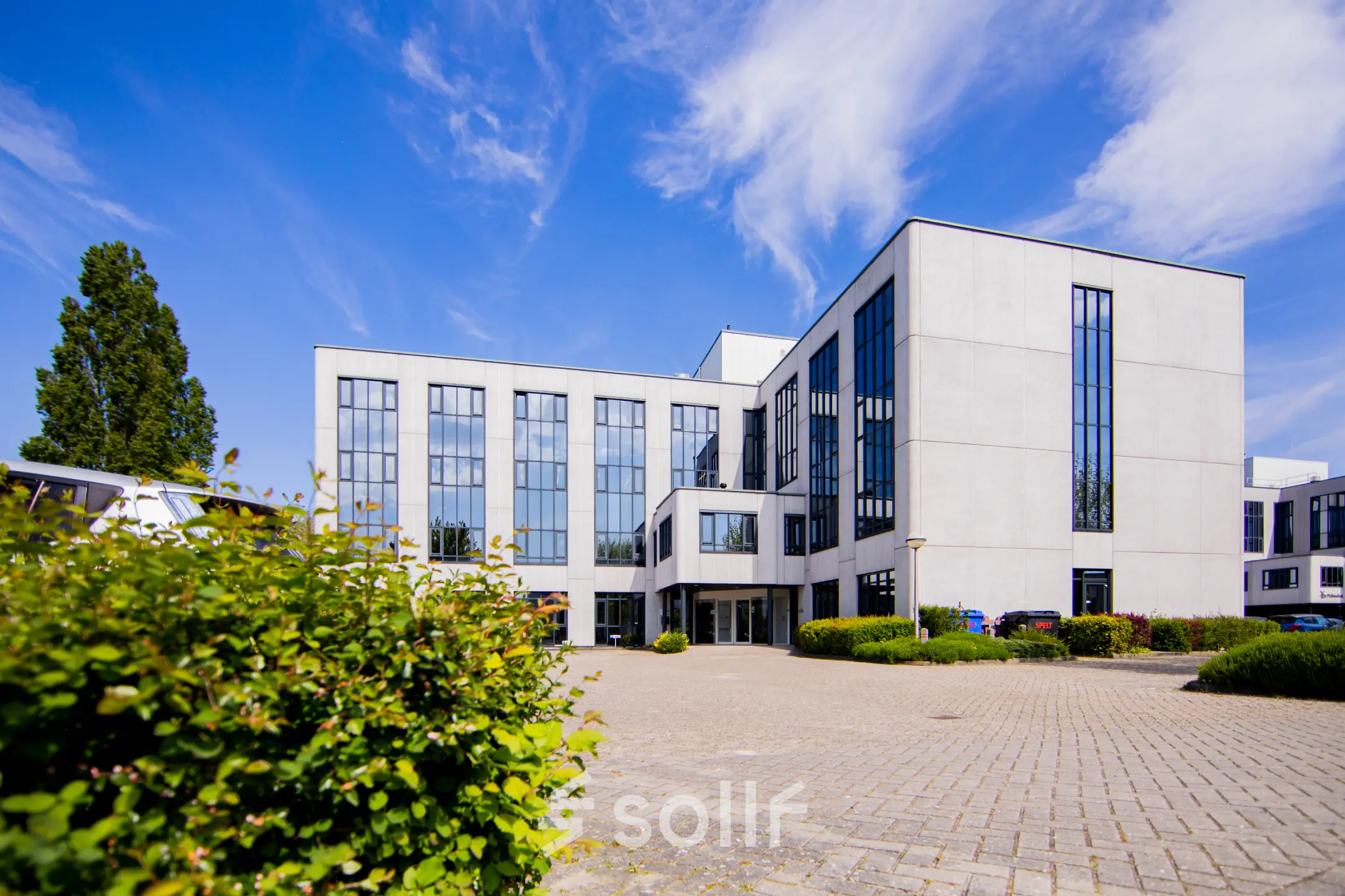 Exterior view of a modern office building located at Pelmolenlaan 16, Woerden, ideal for office space rental.