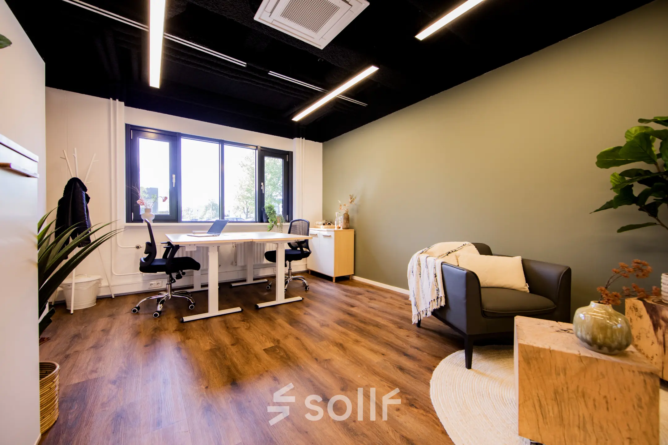 Bright office space at Pelmolenlaan 16, Woerden, featuring modern furnishings ideal for rent. The room includes desks and comfortable seating for a productive work environment.