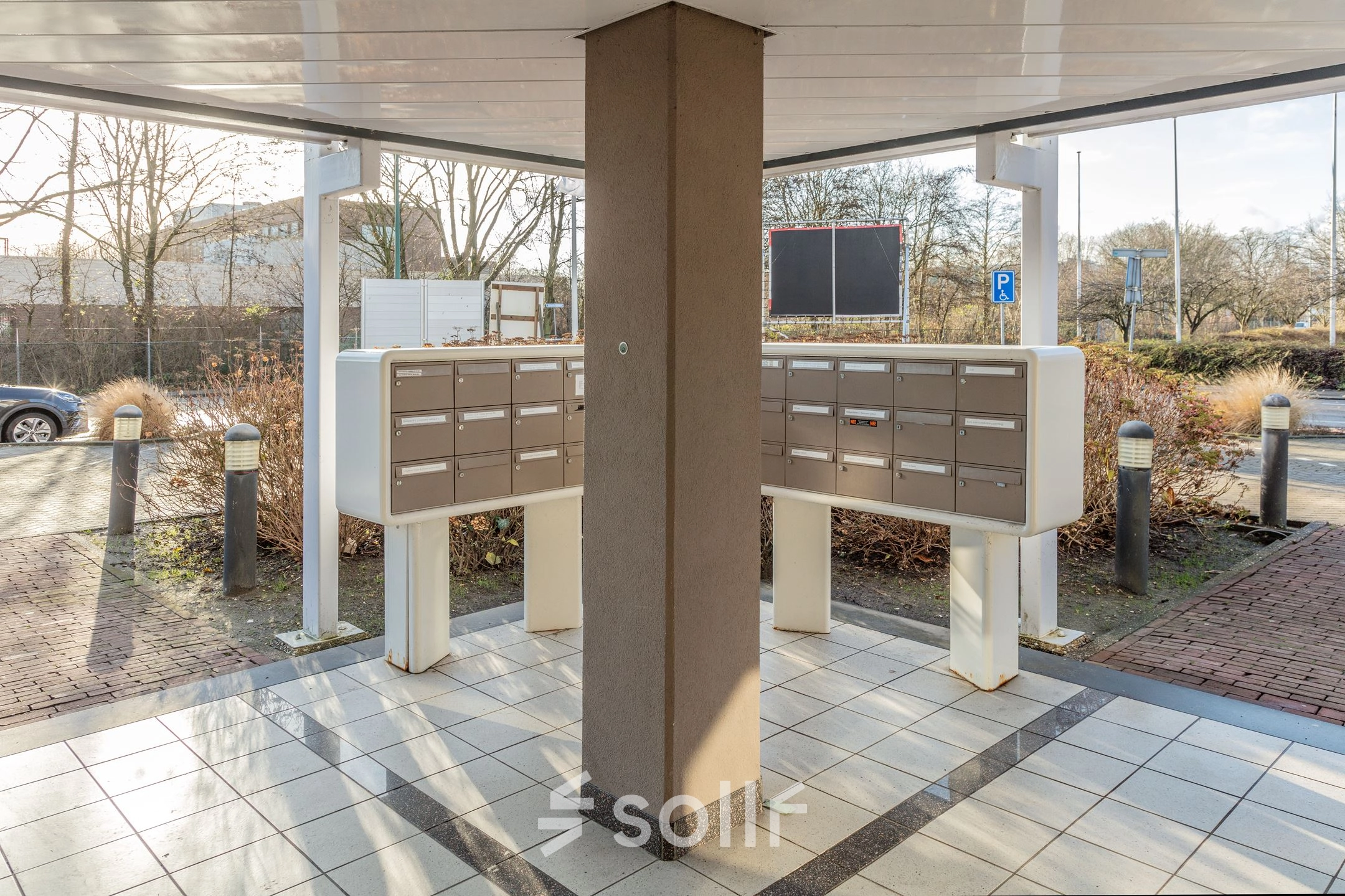 Exterior view of mailboxes at Zaagmolenlaan 4, Woerden, ideal for office space rental.