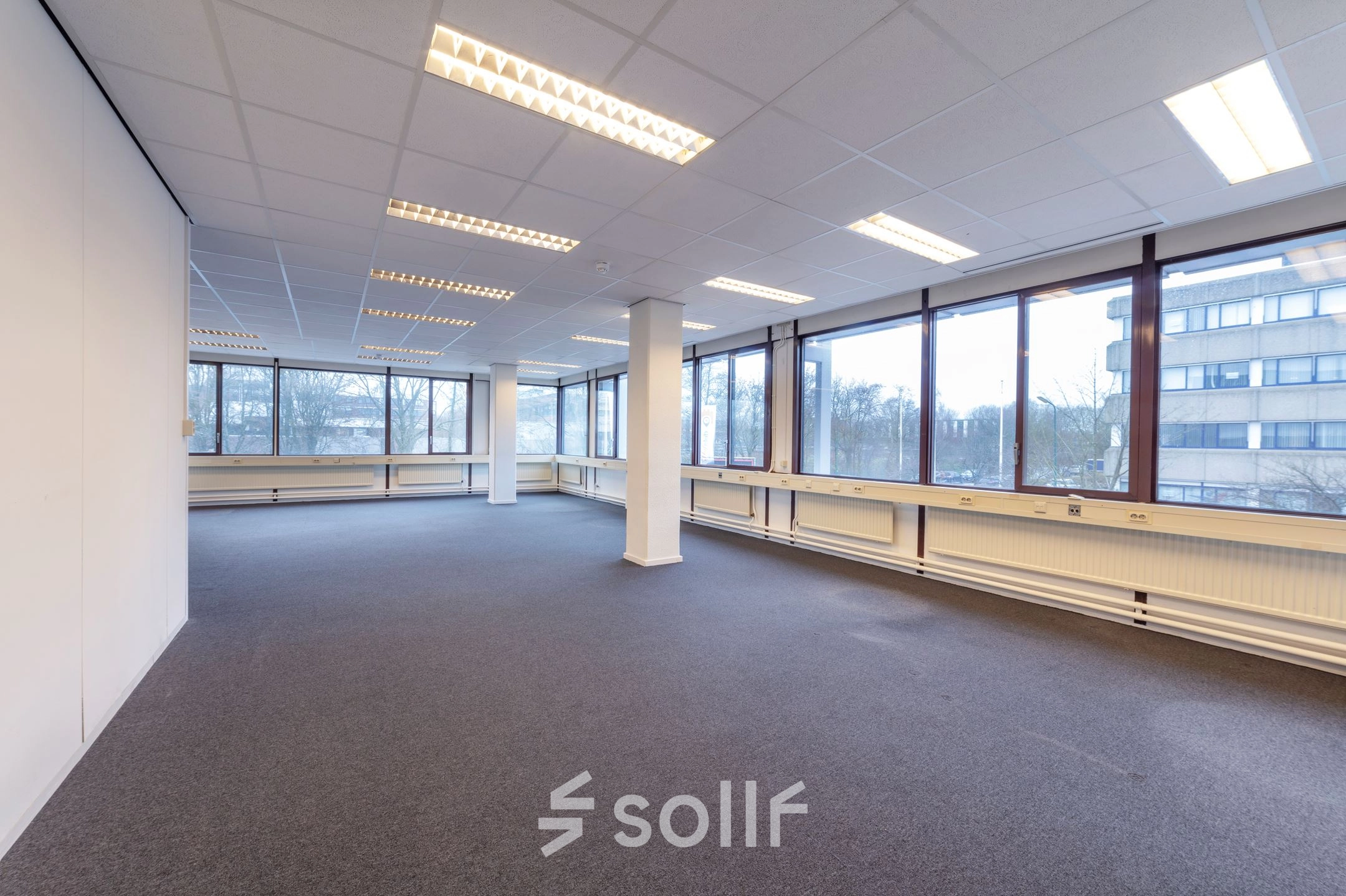 Spacious office to rent at Zaagmolenlaan 4, Woerden, featuring large windows and ample lighting, ideal for office space rental.