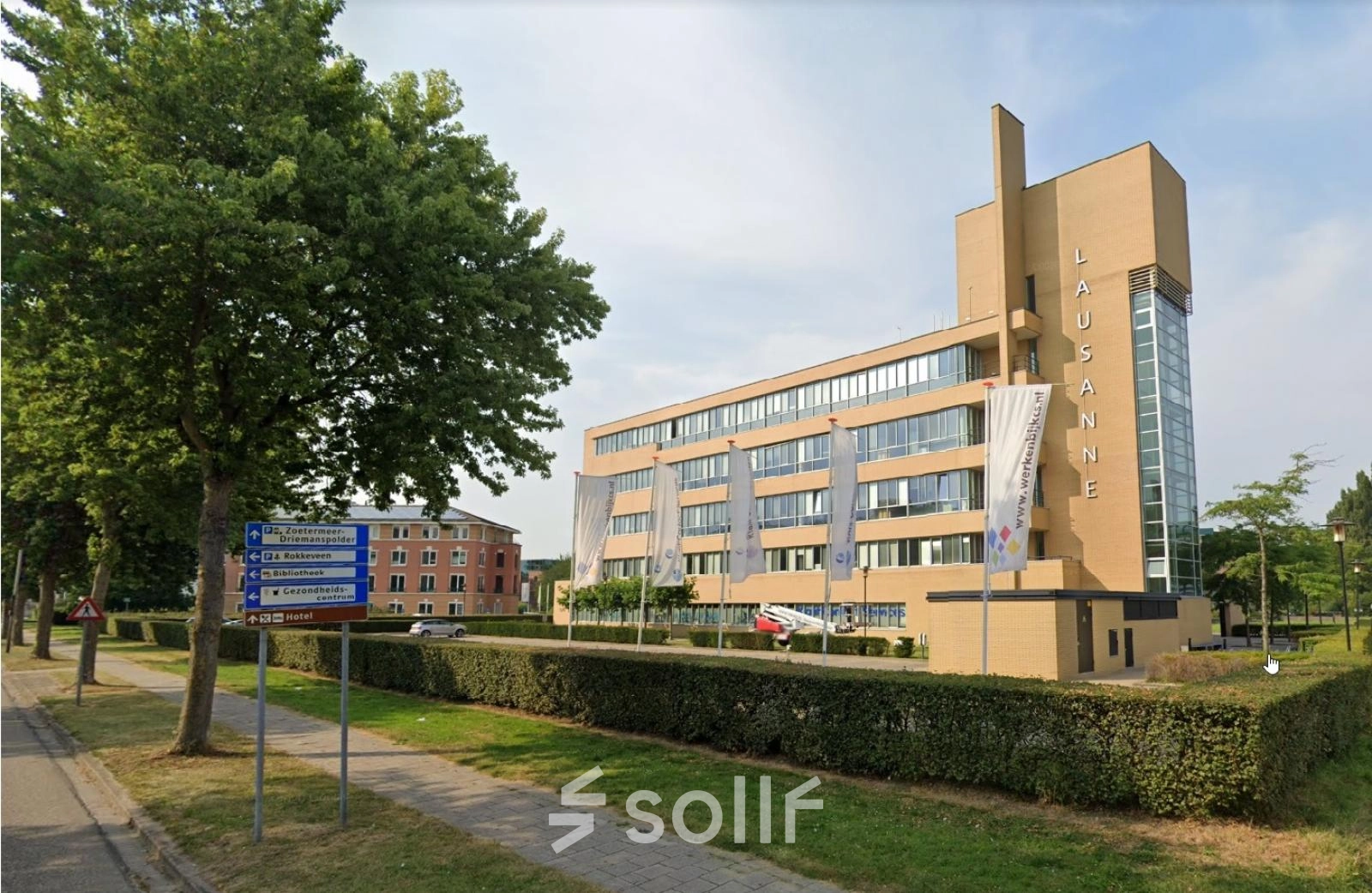 Exterior view of the office building at Baron de Coubertinlaan 35, Zoetermeer, showcasing its modern architectural design. Ideal for companies seeking office space rental in a vibrant location.