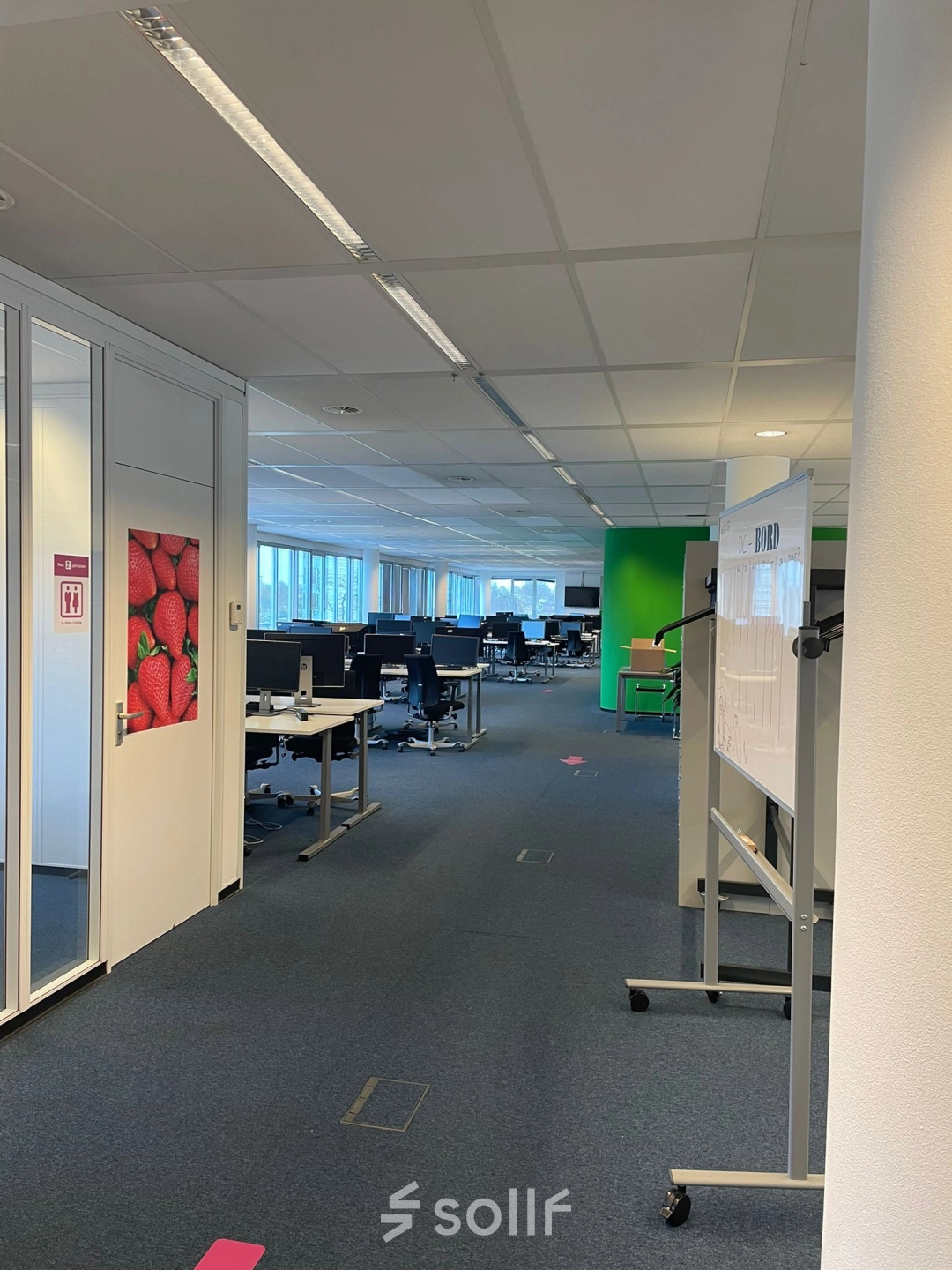 Modern office space available for rent at Baron de Coubertinlaan 35, Zoetermeer. The interior features a spacious, well-lit workspace with desks and chairs.