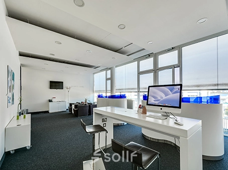 Modern office space at Badenerstrasse 47, Zürich Center with ample natural light, sleek furnishings, and a contemporary design. Ideal for office space rental.
