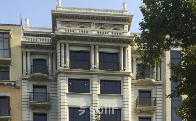 Fachada de un edificio en Avinguda Diagonal 458, Barcelona, ideal para el alquiler de oficinas.