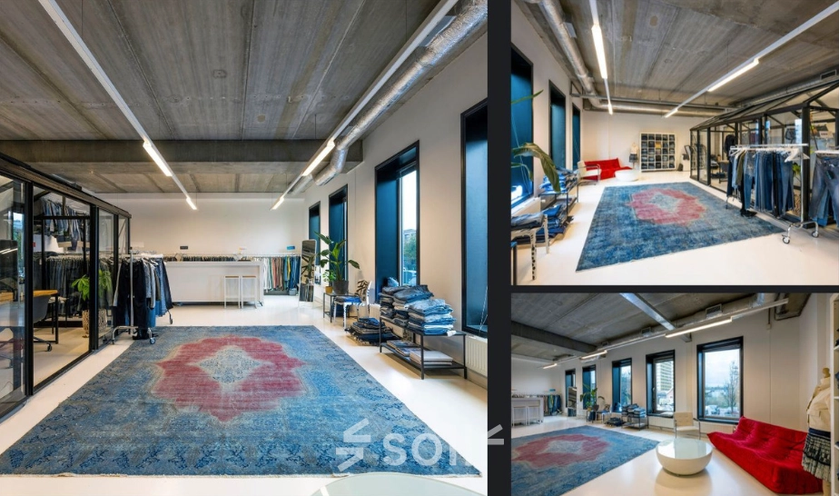 Ruime kantoorruimte huren in Amsterdam Noord met moderne inrichting, grote vloerkleden en veel natuurlijk licht. De ruimte op Meeuwenlaan 98-100 biedt voldoende flexibele werkplekken.