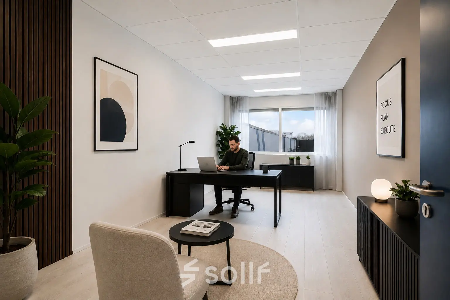 Stijlvolle en moderne kantoorruimte met een persoon die aan het werk is op een laptop aan een strak bureau, omgeven door planten en kunst aan de muur.