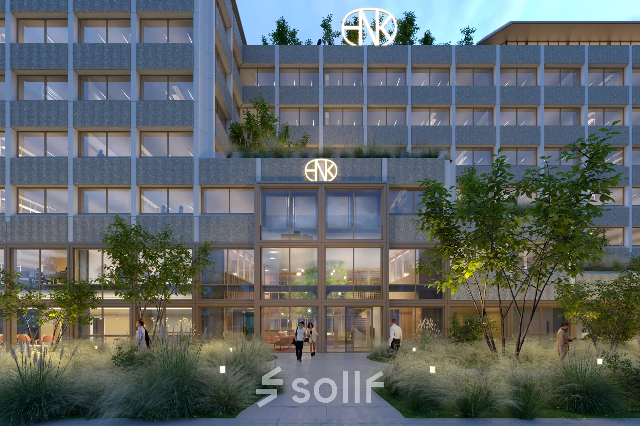 Moderne gevel van een kantoorpand aan de Marten Meesweg 101 in Rotterdam Alexander met verlichte glazen entree en enkele mensen die naar binnen gaan.