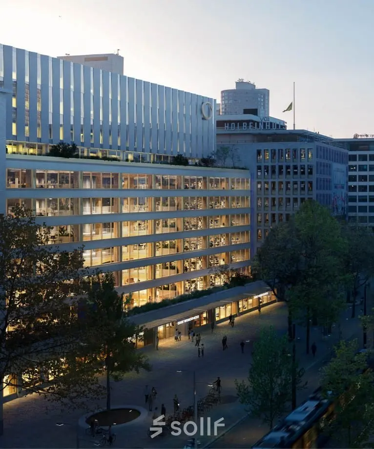 Buitenkant van een modern kantoorpand aan de Coolsingel 75 in Rotterdam Centrum, perfect voor wie kantoorruimte wil huren. Het gebouw is omringd door groen en heeft grote ramen voor veel natuurlijk licht.