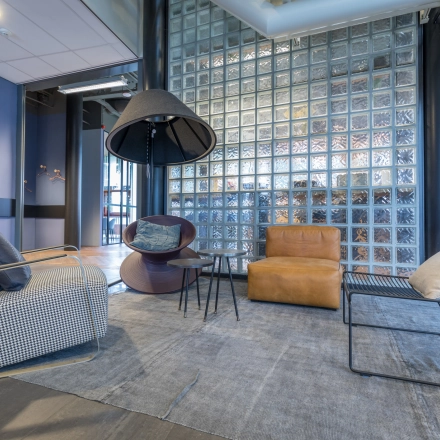 Stylish office to rent at Maanlander 47, Amersfoort Calveen, featuring cozy lounge seating and modern design elements for office space rental.