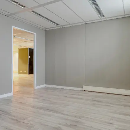 Spacious empty office interior at Asch van Wijckstraat 2-4, ideal for rent office space in Amersfoort Centrum.