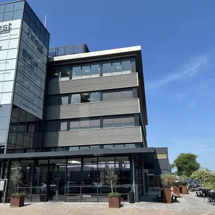 Exterior view of Vanadiumweg 11, Amersfoort Isselt, highlighting a modern multi-story office building available for office space rental.