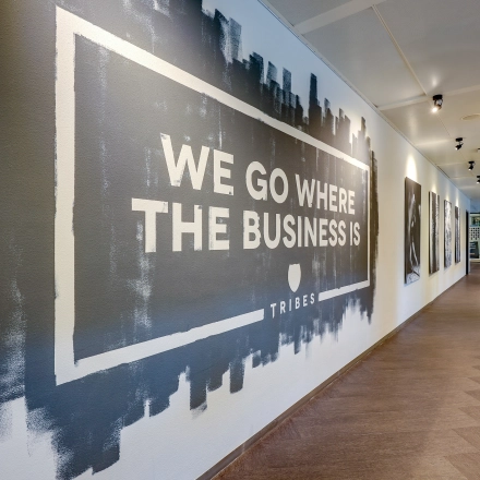 Contemporary hallway at Prins Bernhardplein 200, Amsterdam Amstel; features motivational wall art ideal for a rented office space.