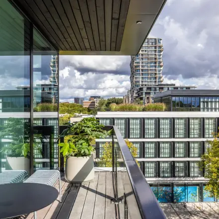 Balcony view at Zwaansvliet 1, showcasing modern office buildings in Amsterdam Buitenveldert available for office space rental.