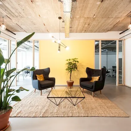 Cozy furnished office space with modern decor available for rent at Singel 542, Amsterdam Canal Belt.