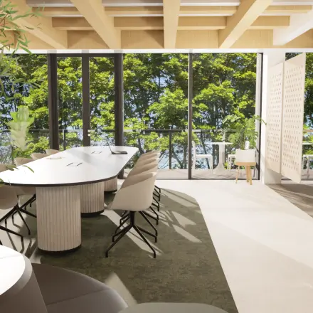 Bright office space at Pieter Cornelisz. Hooftstraat 7, Amsterdam Center, featuring modern furnishings and large windows with greenery views, ideal for office space rental.