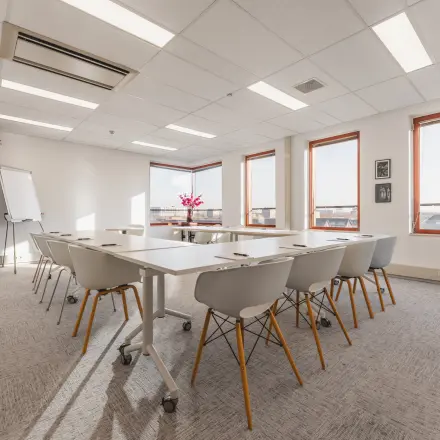 Spacious conference room at Daalwijkdreef 47, Amsterdam Duivendrecht, available for office space rental with modern furnishings and large windows.