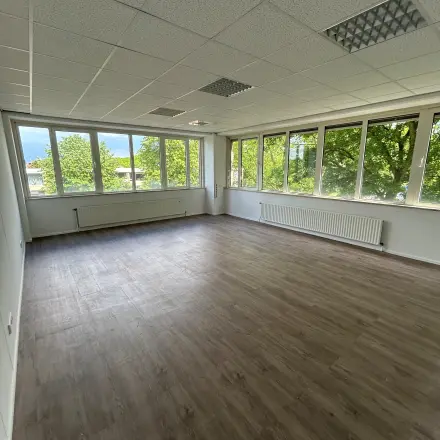 Spacious office to rent at James Wattstraat 71, Amsterdam East, featuring large windows and natural light, ideal for office space rental.