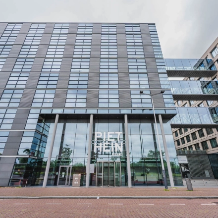 Modern exterior of Piet Heinkade 95B in Amsterdam East, perfect for office space rental.