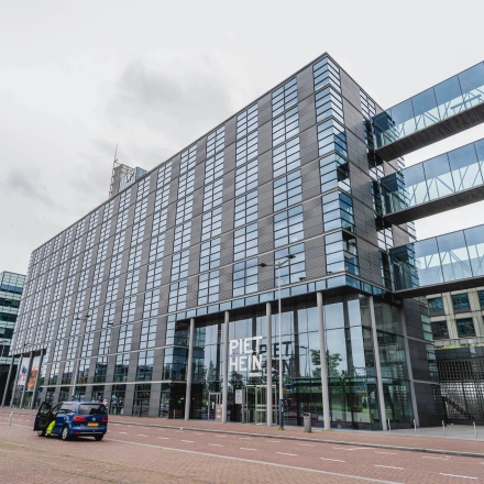 Street view of Piet Heinkade 95B, Amsterdam East, showcasing a modern office building available for rent office space.