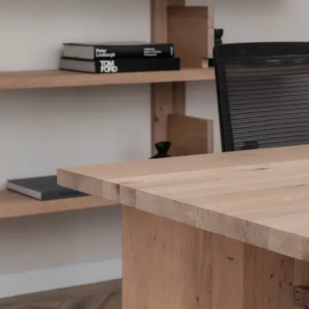 Furnished office interior at Emmalaan 7-9, featuring wooden shelves and a desk in Amsterdam Old South, ideal for office space rental.