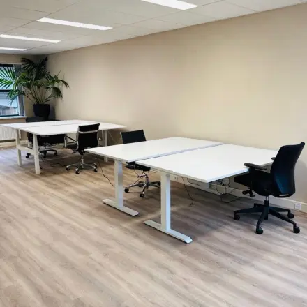 Bright office space at Arlandaweg 92, Amsterdam Sloterdijk, featuring multiple desks and chairs, ideal for office space rental.