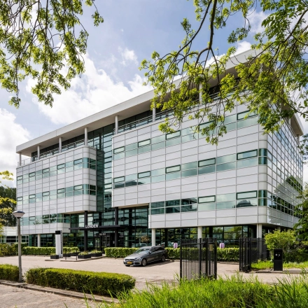 Exterior view of a modern office building located at Burgemeester Stramanweg 102, Amsterdam South East, ideal for office space rental.