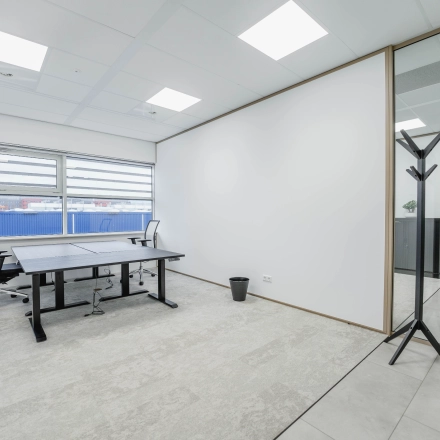 Bright office space interior with desks and chairs, perfect for those seeking office space rental in Amsterdam South East.