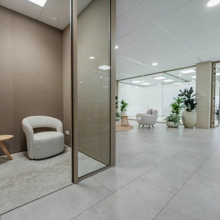 Modern office space at Laarderhoogtweg 7-19, Amsterdam South East featuring a seating area and plants, perfect for office space rental.