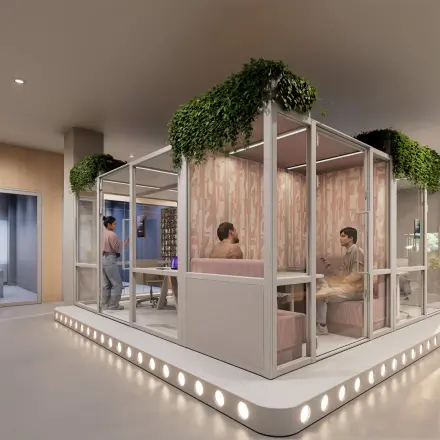 Modern office space at Luttenbergweg 8, Amsterdam South East, featuring stylish furniture and people engaged in collaborative discussions.