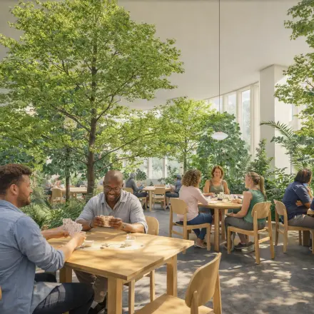 Bright office space with lush indoor greenery at Luttenbergweg 8, Amsterdam South East. People are engaged in discussions and work activities at wooden tables, adding vibrancy to office space rental atmosphere.